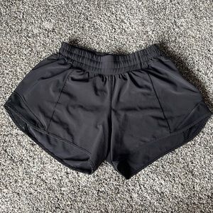 black low rise 4 inch size 4 lululemon hotty hots